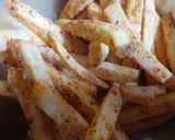 A picture of step 1 of Cheesy Mushroom French Fries.
