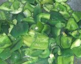 A picture of step 1 of Capsicum Potato dry sabzi.