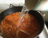 A picture of step 3 of Arroz Rojo.