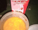 A picture of step 1 of Mango strawberry yogurt smoothie.