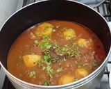A picture of step 6 of Special Aloo Gosht.