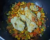 A picture of step 4 of Steamed Stuffed Suji Balls.