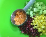 A picture of step 1 of Pomegranate and Corn Salad.
