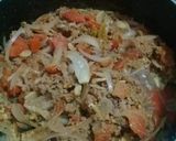 A picture of step 1 of Baingan Qeema.