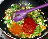 A picture of step 2 of Restaurant Style veg schezwan rice.