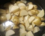 A picture of step 2 of Saffron Flowers with English Peas and Potatoes.
