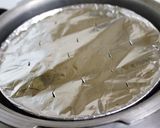 A picture of step 4 of Steamed Eggless Bread Pudding.