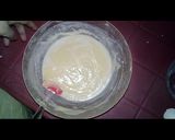 A picture of step 6 of Australian cake.. chocalate toping on vanilla cake.