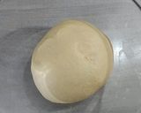 A picture of step 4 of Mardi Gras Chocolate Donuts.