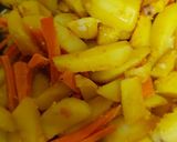 A picture of step 8 of Roast potatoes, carrots served with cabbage and kachumbari.