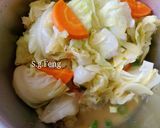 A picture of step 9 of Steamed Chicken Thighs with Cabbage (Rice Cooker Version).