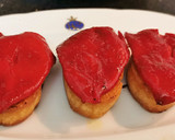 Foto del paso 8 de la receta: Pincho de Morcilla con Piquillos, Cebolla caramelizada y Piñones