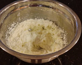 A picture of step 4 of Lemon Layer Cake with Blackberrie Cream Filling and a Lemon Cream Frosting.