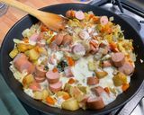 Une image de l'étape 10 de Pâtes d’Alsace aux légumes sautés, saucisses et emmental.