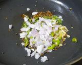 A picture of step 2 of Sooji bun rava dosa.