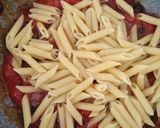 Foto del paso 4 de la receta: Penne all'aglio, acciughe, pomodoro, olive nere
