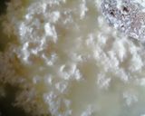 A picture of step 1 of Hyderabadi Lauki Kheer with Mini Rasgullas.