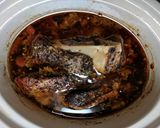 A picture of step 5 of Tangy Crock-Pot Pork.
