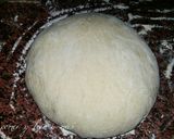 Foto del paso 4 de la receta: Hogaza de pan rellena de beicon, tres quesos y setas