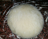 Foto del paso 4 de la receta: Hogaza de pan rellena de beicon, tres quesos y setas