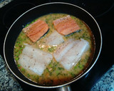 Foto del paso 9 de la receta: Merluza y salmón en salsa verde