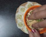 A picture of step 3 of Sandwich pizza from leftover Roti.
