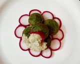 A picture of step 7 of Green Appam with Radish leaves & Green Gram.