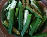 A picture of step 1 of Besan wali Bhindi.