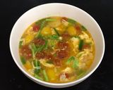 Hình bước làm 5 của món Canh Cà Chua Bi Nấu Trứng