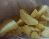 Foto del paso 5 de la receta: Guiso zapallitos italianos con papas doradas