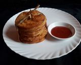 A picture of step 11 of Potato Mathri.