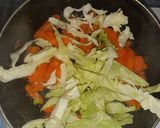 A picture of step 1 of Super Delicious Carrot-Cabbage Egg.