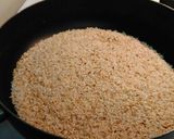 A picture of step 5 of Arroz Con Pollo.