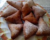 A picture of step 5 of Mandazi with cardamom powder.
