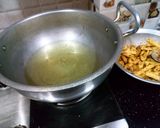 A picture of step 3 of Masala French fries.