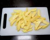পটেটো ওয়েজেস (Potato Wedges recipe in Bengali) রেসিপির ধাপ 2 ছবি