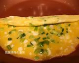 A picture of step 4 of Scallion Egg Roll Omelet.
