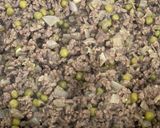 Une image de l'étape 3 de Samoussas à la viande hachée et aux petits pois.
