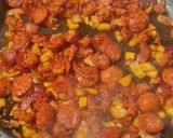 A picture of step 2 of Chicken and Chorizo Risotto.