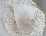A picture of step 2 of Coconut puff puff.