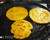 A picture of step 6 of Sarso Saag with Makki Roti.