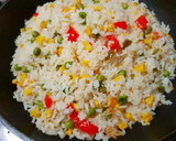 Foto del paso 4 de la receta: Arroz con maíz y guisantes