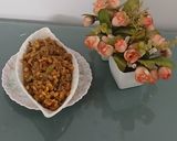 A picture of step 6 of Bitter gourd with chana dal masala.