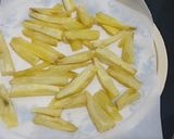 A picture of step 5 of Peri Peri Sweet Potato Fries.