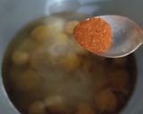 A picture of step 2 of Aloo bukharay ki chutney.