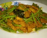 Foto langkah ke 7 dari resep Tumis tempe buncis masak kuning.