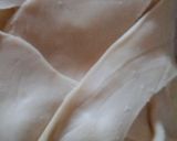 Foto del paso 3 de la receta: Trenza de hojaldre rellena de salami y queso