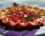 Une image de l'étape 3 de Tarte corolle aux Tomates cerise et cœurs d’Artichauts.