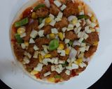 A picture of step 4 of Chicken tikka pizza.