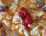A picture of step 4 of Mexican chicken enchiladas.